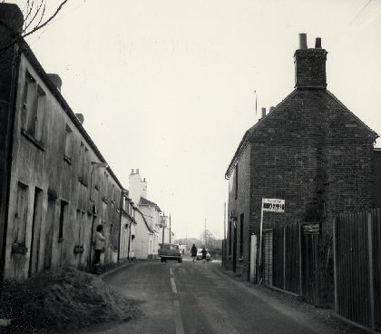Fig. 9 The High Street c.1981, with the Old Post Office on the right and Russell Row on the left