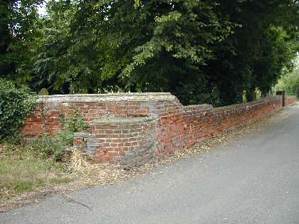 Fig. 28 Mounting block on south west corner of churchyard wall.