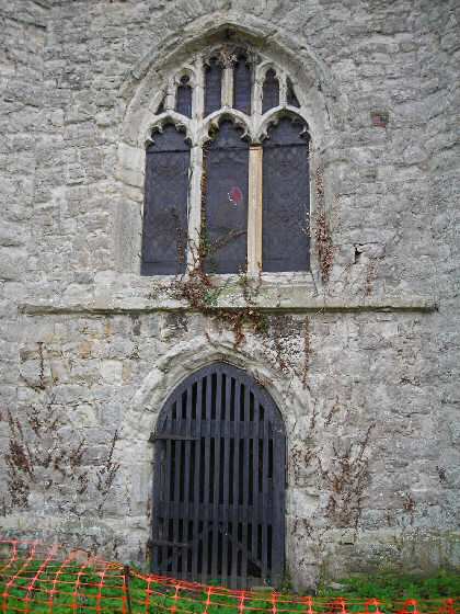 Fig. 32 West window and door, currently barriered-off.
