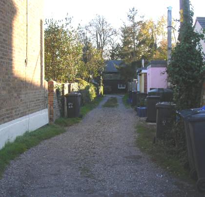 Fig. 14 Rear access to Boarded Row, between New Row and Shop Row.