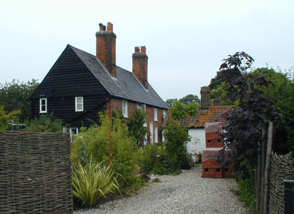Fig. 36 Barn Row, south side, with pantiled wash house.